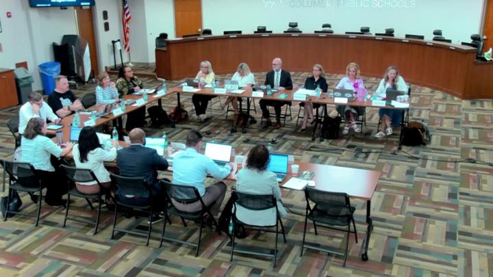 CPS School Board Members and school administrators in a U-shaped set up at their May 21, 2026, meeting.